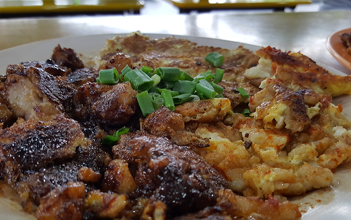 A mix of black and white carrot cake with eggs